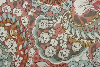 The Robert Allen© Zen Paisley in Coral is a multi-use fabric.  It features a classic floral paisley print and an array of versatile colors, such as coral, brown, light seafoam green, dark gold, and ivory. The fabric is made to last, boasting a 100,000 double rub rating.  It can be used for several different statement projects including window accents (drapery, curtains and swags), toss pillows, headboards, bed skirts, duvet covers, upholstery, and more.