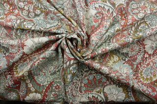 The Robert Allen© Zen Paisley in Coral is a multi-use fabric.  It features a classic floral paisley print and an array of versatile colors, such as coral, brown, light seafoam green, dark gold, and ivory. The fabric is made to last, boasting a 100,000 double rub rating.  It can be used for several different statement projects including window accents (drapery, curtains and swags), toss pillows, headboards, bed skirts, duvet covers, upholstery, and more.