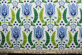 Robert Allen© Ornate Frame in Ultramarine features ornate tulips against a white background.  Crafted with 21,000 double rubs, this design is truly versatile and perfect for any room. Enjoy the unique combination of blue and green to add a touch of charm and sophistication to your events.  It can be used for several different statement projects including window accents (drapery, curtains and swags), toss pillows, headboards, bed skirts, duvet covers, upholstery, and more.