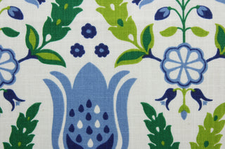 Robert Allen© Ornate Frame in Ultramarine features ornate tulips against a white background.  Crafted with 21,000 double rubs, this design is truly versatile and perfect for any room. Enjoy the unique combination of blue and green to add a touch of charm and sophistication to your events.  It can be used for several different statement projects including window accents (drapery, curtains and swags), toss pillows, headboards, bed skirts, duvet covers, upholstery, and more.