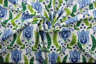 Robert Allen© Ornate Frame in Ultramarine features ornate tulips against a white background.  Crafted with 21,000 double rubs, this design is truly versatile and perfect for any room. Enjoy the unique combination of blue and green to add a touch of charm and sophistication to your events.  It can be used for several different statement projects including window accents (drapery, curtains and swags), toss pillows, headboards, bed skirts, duvet covers, upholstery, and more.