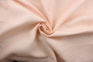 Robert Allen© Kilrush II is a versatile, solid linen fabric in a soft pink hue.  It is ideal for light upholstery, drapery, pillows, bedding, and apparel.  It's the perfect choice for a sophisticated and stylish feel.