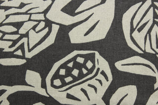 Create a modern atmosphere with the Robert Allen© Cutwork Floral in Truffle. This sophisticated fabric offers a contemporary floral print in brown and beige, and is 100,000 double rubs durable with a soil and stain repellant finish.  It can be used for several different statement projects including window accents (drapery, curtains and swags), toss pillows, headboards, bed skirts, duvet covers, upholstery, and more.