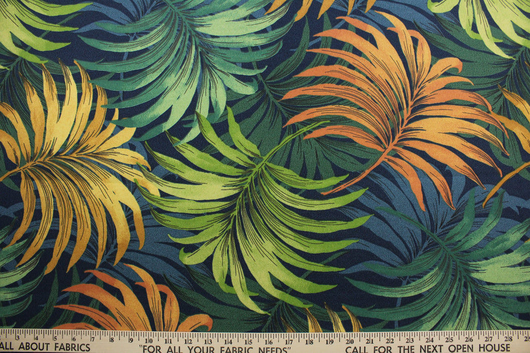 stunning tropical leaf design in vibrant colors of orange, green, golden yellow, and blue.  It is made to withstand up to 50 hours of direct sunlight while still looking as beautiful and colorful as the day you put it out. Additionally, the fabric is water and stain resistant, so it's sure to last for years. Perfect for patio, deck and poolside.  It can be used for several different statement projects including cushions, upholstery projects and decorative pillows. 