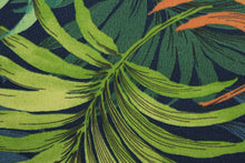Load image into Gallery viewer, stunning tropical leaf design in vibrant colors of orange, green, golden yellow, and blue.  It is made to withstand up to 50 hours of direct sunlight while still looking as beautiful and colorful as the day you put it out. Additionally, the fabric is water and stain resistant, so it&#39;s sure to last for years. Perfect for patio, deck and poolside.  It can be used for several different statement projects including cushions, upholstery projects and decorative pillows. 
