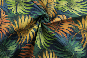 stunning tropical leaf design in vibrant colors of orange, green, golden yellow, and blue.  It is made to withstand up to 50 hours of direct sunlight while still looking as beautiful and colorful as the day you put it out. Additionally, the fabric is water and stain resistant, so it's sure to last for years. Perfect for patio, deck and poolside.  It can be used for several different statement projects including cushions, upholstery projects and decorative pillows. 