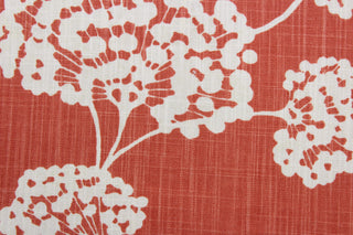  Robert Allen© Toile Stems in Coral is perfect for multi-use projects. This durable fabric features a large white floral print on a coral background and is crafted with 65,000 double rubs for added resilience.  It is also stain and odor resistant for longevity and easy care.  It can be used for several different statement projects including window accents (drapery, curtains and swags), toss pillows, headboards, bed skirts, duvet covers, upholstery, and more.