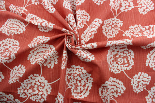  Robert Allen© Toile Stems in Coral is perfect for multi-use projects. This durable fabric features a large white floral print on a coral background and is crafted with 65,000 double rubs for added resilience.  It is also stain and odor resistant for longevity and easy care.  It can be used for several different statement projects including window accents (drapery, curtains and swags), toss pillows, headboards, bed skirts, duvet covers, upholstery, and more.