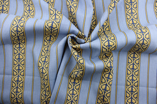 The Jagger in Blue is a dynamic multipurpose fabric boasting a vibrant leaf scroll and stripe design.  Its beautiful colors of blue, yellow, and white make it a great addition to any room.  Plus, it is soil and stain resistant for easy maintenance.  It can be used for several different statement projects including window accents (drapery, curtains and swags), toss pillows, headboards, bed skirts, duvet covers, upholstery, and more.