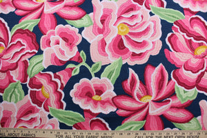 Robert Allen© O'Keefe Bloom in High Noon features a colorful large scale floral print in shades of pink, green, yellow, and white on an indigo background.  This high quality, multi-use fabric is highly durable, boasting a 30,000 double rub rating.  It can be used for several different statement projects including window accents (drapery, curtains and swags), toss pillows, headboards, bed skirts, duvet covers and upholstery. 