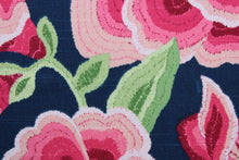 Load image into Gallery viewer, Robert Allen© O&#39;Keefe Bloom in High Noon features a colorful large scale floral print in shades of pink, green, yellow, and white on an indigo background.  This high quality, multi-use fabric is highly durable, boasting a 30,000 double rub rating.  It can be used for several different statement projects including window accents (drapery, curtains and swags), toss pillows, headboards, bed skirts, duvet covers and upholstery. 
