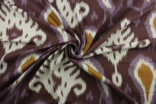  Bring a luxurious, exotic look to your home with Robert Allen© Batavia in Amethyst. This multi-use fabric features a large scale ikat print in eye-catching shades of violet, antique gold, off white, and eggplant.  It is also highly durable, boasting a 21,000 double rub rating and soil and stain resistance.  It can be used for several different statement projects including window accents (drapery, curtains and swags), toss pillows, headboards, bed skirts, duvet covers, upholstery, and more.