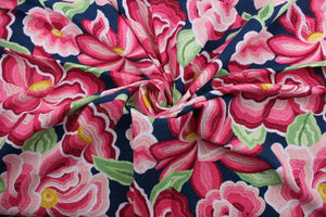 Robert Allen© O'Keefe Bloom in High Noon features a colorful large scale floral print in shades of pink, green, yellow, and white on an indigo background.  This high quality, multi-use fabric is highly durable, boasting a 30,000 double rub rating.  It can be used for several different statement projects including window accents (drapery, curtains and swags), toss pillows, headboards, bed skirts, duvet covers and upholstery. 