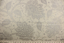 Load image into Gallery viewer, Robert Allen© Paisley Petals in Barley is a multi purpose heavyweight fabric with distinctive paisley petals and a slight sheen.  Durable and resilient, it has a strength of 30,000 double rubs and is soil and stain resistant. It can be used for several different statement projects including window accents (drapery, curtains and swags), toss pillows, headboards, bed skirts, duvet covers, upholstery, and more.
