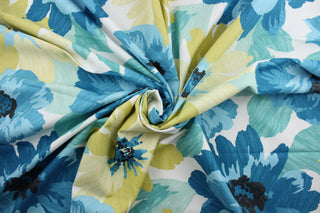  a multi-purpose fabric featuring a large floral print in shades of gold and blue, as well as black and white. This fabric is incredibly tough, boasting a 100,000 double rub rating, and is soil and stain repellent to help keep it looking as good as new.  It can be used for several different statement projects including window accents (drapery, curtains and swags), toss pillows, headboards, bed skirts, duvet covers, upholstery, and more.