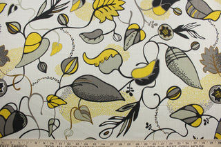 The Robert Allen© Magnus in Citrine features a retro wandering vines and leaf pattern in citrine, gray, black and brown on an ivory background.  This multi-purpose fabric offers excellent durability and performance, with a rating of 21,000 double rubs and soil and stain resistance.  It can be used for several different statement projects including window accents (drapery, curtains and swags), toss pillows, headboards, bed skirts, duvet covers, upholstery, and more.
