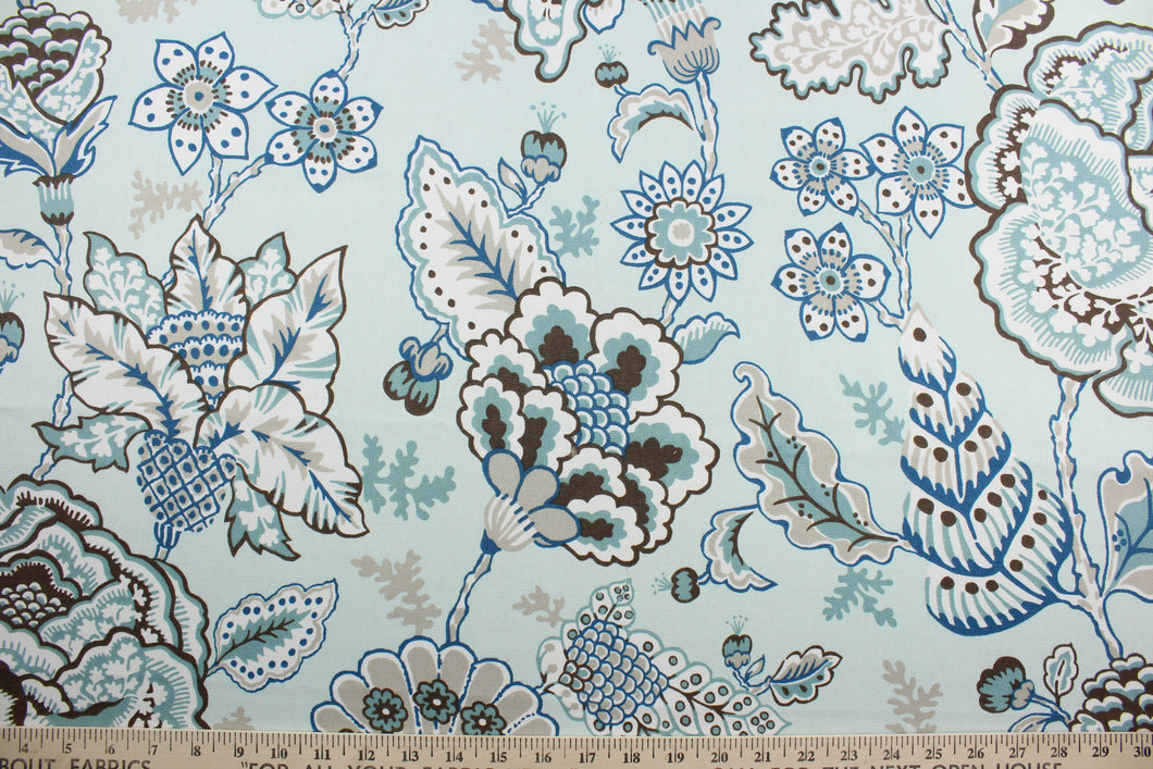This beautiful floral fabric features a charming blend of sea green, blue, brown, taupe, and white colors, making it perfect for creating a variety of unique designs.  It features a soil and stain repellant finish and is rated at 100,000 double rubs for durability and abrasion resistance.  It can be used for several different statement projects including window accents (drapery, curtains and swags), toss pillows, headboards, bed skirts, duvet covers, upholstery, and more.