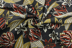The exciting floral print features a palette of light gray, gold, brown, rust, and ivory on a charcoal background.  The multi-purpose fabric is soil and stain resistant and has been tested to withstand up to 65,000 double rubs for added durability.  It can be used for several different statement projects including window accents (drapery, curtains and swags), toss pillows, headboards, bed skirts, duvet covers and upholstery. 