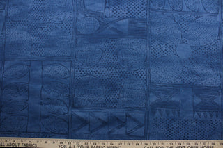 Robert Allen© Cassava in Lapis is a stylish multi-purpose fabric featuring a unique geometrical print in blue hues.  It has been engineered with a soil and stain repellant finish and is highly durable, with a fabric rating of 100,000 double rubs.  It can be used for several different statement projects including window accents (drapery, curtains and swags), toss pillows, headboards, bed skirts, duvet covers, upholstery, and more.