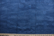 Load image into Gallery viewer, Robert Allen© Cassava in Lapis is a stylish multi-purpose fabric featuring a unique geometrical print in blue hues.  It has been engineered with a soil and stain repellant finish and is highly durable, with a fabric rating of 100,000 double rubs.  It can be used for several different statement projects including window accents (drapery, curtains and swags), toss pillows, headboards, bed skirts, duvet covers, upholstery, and more.

