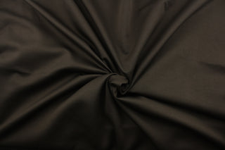 This multi purpose, solid coca brown fabric offers beautiful design, style and color to any space in your home.&nbsp; It has a soft workable feel and is perfect for apparel, window treatments (draperies, valances, curtains, and swags), bed skirts, duvet covers, light upholstery, pillow shams and accent pillows.&nbsp;