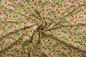 Flower Girl features a bright and cheerful floral print in a range of colors: mustard yellow, green, red, pink, light blue, white, and black on a yellow background.  The high-quality cotton material ensures lasting durability and softness, making it perfect for your next quilting or stitching project.  The versatile lightweight fabric is soft and easy to sew.  It would be great for apparel, quilting, crafting and sewing projects.  