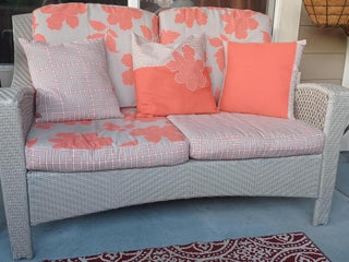 Pair Dwell Studios New Peony Outdoor Fabric in Coral with Dwell Studios Fretscene Outdoor Fabric to add a pop of color to your home decor.