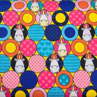 Despicable Me Fluffy Unicorn Circles Flannel Cotton Fabric in Multi