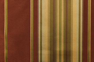 This stunning yarn dyed fabric features a multi width striped pattern in a deep red tone, with gold, green, and khaki.