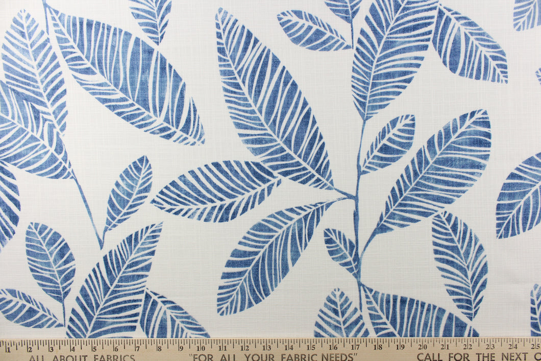 This beautiful design features a gorgeous large leaf print in blue against a white background.