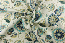 Load image into Gallery viewer,  This fun fabric features a floral pattern in blue, brown, teal, khaki, dark green, and a brown gray  on a off white background. 
