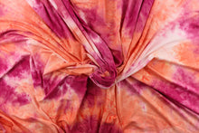 Load image into Gallery viewer,   This lycra features an 8 way stretch in a  fun tie dye design, with colors of orange, deep pink and hints of white.
