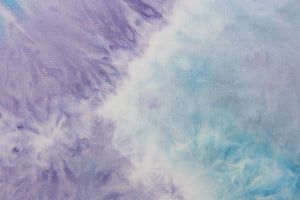  This lycra features an 8 way stretch in a fun tie dye design, with colors of pale purple, shades of blue and hints of white.
