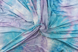  This lycra features an 8 way stretch in a fun tie dye design, with colors of pale purple, shades of blue and hints of white.