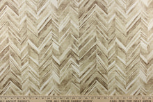 Load image into Gallery viewer,  This fabric features a chevron design in shades of brown and white.
