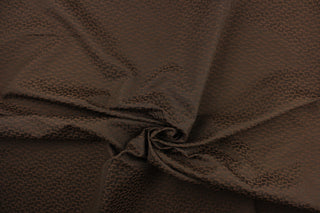 This duo tone fabric in brown is great for home decor such as multi- purpose upholstery, window treatments, pillows, duvet covers, tote bags and more.  It has a soft workable feel yet is stable and durable with a rating of 15,000 double rubs.  