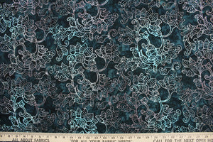 This fabric features a large floral design in dull white on a dark slate background.  It has a nice soft hand and would be great for quilting, crafting and home decor.  