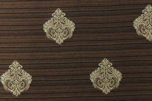 Ornamental damask medallion with hints of light blue on a dark brown background
