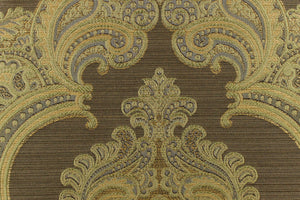 ornamental damask design in green and gray and hints of light gold on a dark gold background