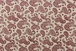  A fun paisley design in basic colors of  red set against a cream background. 
