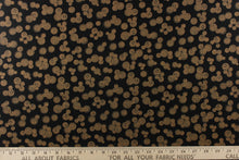 Load image into Gallery viewer,  This elegant quilting print features vintage buttons in a copper or khaki color in different sizes set against a black background. 
