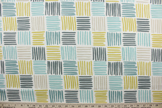 Ernie is a multiuse fabric featuring a linear box print design in an array of colors including beige, dark grey, spa green, teal and dark yellow on a dull white background. It can be used for several different statement projects including window accents (drapery, curtains and swags), decorative pillows, hand bags, bed skirts, duvet covers, upholstery and craft projects.  It has a soft workable feel yet is stable and has a durability rating of 30,000 double rubs.