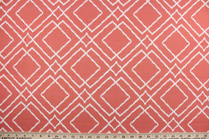 Jacava is a multi use fabric featuring a geometrical design in coral and white.  It can be used for several different statement projects including window accents (drapery, curtains and swags), decorative pillows, hand bags, bed skirts, duvet covers, upholstery and craft projects.  It has a soft workable feel yet is stable and has a durability rating of 15,000 double rubs.
