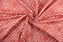 Load image into Gallery viewer, Jacava is a multi use fabric featuring a geometrical design in coral and white.  It can be used for several different statement projects including window accents (drapery, curtains and swags), decorative pillows, hand bags, bed skirts, duvet covers, upholstery and craft projects.  It has a soft workable feel yet is stable and has a durability rating of 15,000 double rubs.
