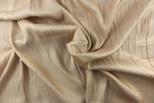 Load image into Gallery viewer, This fabric in gold with iridescent and a crinkle design.
