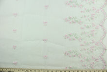 Load image into Gallery viewer, This fabric features a beautiful embroidered floral vine design with pink pearlized beads with a scalloped edge.  The sheer fabric is see through with a nice flowy drape.  It is perfect for special occasion apparel, costumes, overlays, table tops, décor, sheer curtains and more.  Colors include white, pink and green.
