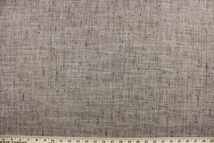  Handcroft is a woven and textured multi use jacquard fabric in pale mocha, ivory and charcoal.  It is durable with 51,000 double rubs and would be great for upholstery, bedding, cornice boards, accent pillows and window treatments.