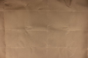  A  rich solid tan fabric great for umbrellas, outdoor upholstery and more.
