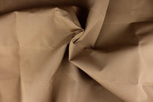 Load image into Gallery viewer,  A  rich solid tan fabric great for umbrellas, outdoor upholstery and more.

