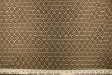 Load image into Gallery viewer, Hubble is a jacquard fabric that features circles in varying shades of brown and gold.
